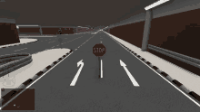 a red stop sign is in the middle of a road
