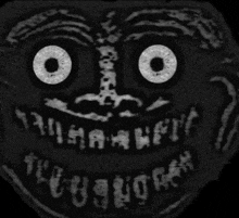 a black and white drawing of a face with a smile and the word ' tcg ' on the bottom