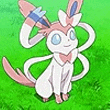 a pink and white pokemon is sitting on top of a green field .