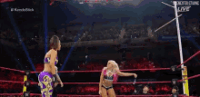 two women are wrestling in a ring with a referee and the words #kendoslick on the bottom