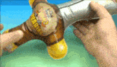 a person is holding an inflatable sword that says ' samurai ' on it