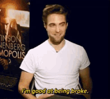 I'M Good At Being Broke GIF - Robert Pattinson Im Good At Being Broke Smile GIFs