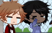 a boy with a watch on his wrist is standing next to another boy who is crying