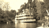 a black and white photo of a boat on a river with gifrun.com in the corner