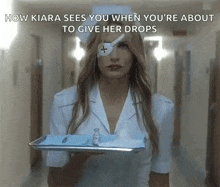 a nurse with a bandage on her eye is holding a tray with a needle in it .
