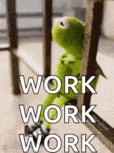 kermit the frog is sitting on a railing with the words `` work work work '' written above him .