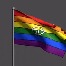 a rainbow flag with a white sd logo on it