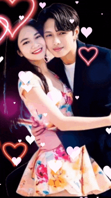 a man and woman are hugging each other with hearts around them
