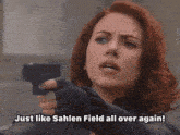 a woman with red hair is holding a gun and saying `` just like sahlen field all over again ! ''