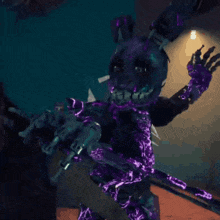 a purple rabbit is standing next to a man in a dark room