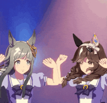 two anime girls are standing next to each other with their hands up