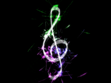 a colorful treble clef is surrounded by fireworks