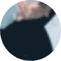a pixelated image of a person 's face is in a circle