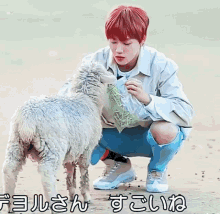a man kneeling down with a sheep in front of a sign that says ' jiangjun '