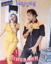a woman singing into a microphone next to a man holding a microphone with the word dihobahh on the bottom