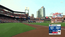 a blue jays baseball game is being played and the score is 101 to 387