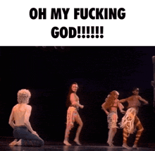 a man is kneeling in front of a group of dancers with the words oh my fucking god written above them