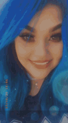 a woman with blue hair and the name jazmin on the bottom right