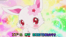 a pink and white bunny with a flower in its hair is saying `` it 's my birthday '' .