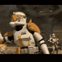 a close up of a storm trooper holding a gun in a video game