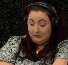 a woman wearing a pair of headphones that say ' stereo ' on it