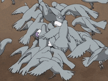 a bunch of birds are laying on the ground in a cartoon