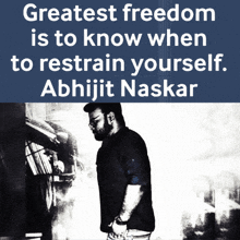 a man stands in front of a sign that says " greatest freedom is to know when to restrain yourself "