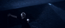 a dark blue background with a lot of bubbles