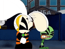 a group of cartoon characters are standing in front of a building that has the letter a on it