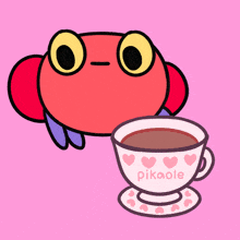 a cartoon of a frog next to a cup of pikaole