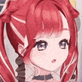 a close up of a girl with red hair and blue eyes .