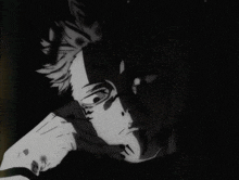 a black and white drawing of a man 's face with a shadow on it .