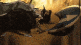 a cartoon character is laying on the ground with a knife and a sword .