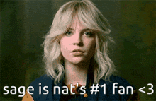 sage is nat 's # 1 fan < 3 is written above a woman 's face