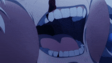a close up of a person 's mouth with their mouth open