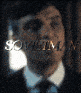 a close up of a man 's face with the word sovietman written above him