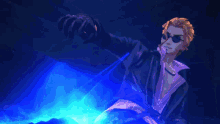a man wearing sunglasses and a black jacket stands in a dark room with a blue light behind him