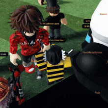 a girl in a red shirt that says fan is standing next to a boy in a black shirt that says at is coming on
