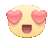 a yellow smiley face with pink heart shaped eyes and a mouth open .