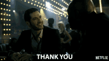 a netflix ad shows two men talking and says " thank you "