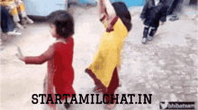 two little girls are dancing in front of a sign that says startamlchat.in