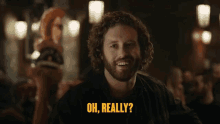 a man with a beard says oh really