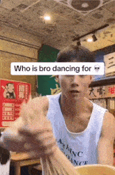 a man in a white tank top is holding a bowl of noodles with a caption that says who is bro dancing for
