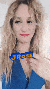 a woman in a blue dress has the name j ross on her neck