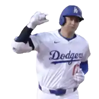 a dodgers baseball player is wearing a white jersey