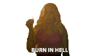a woman in a pink shirt is making a rude gesture
