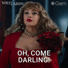 a woman in a red dress is holding a flower and says oh come darling