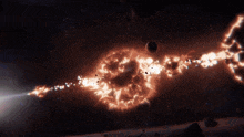 a glowing object in the middle of a dark space