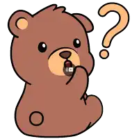 a brown teddy bear with a question mark on its face