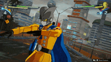 a video game screen shows a character in a yellow and blue outfit with a cape